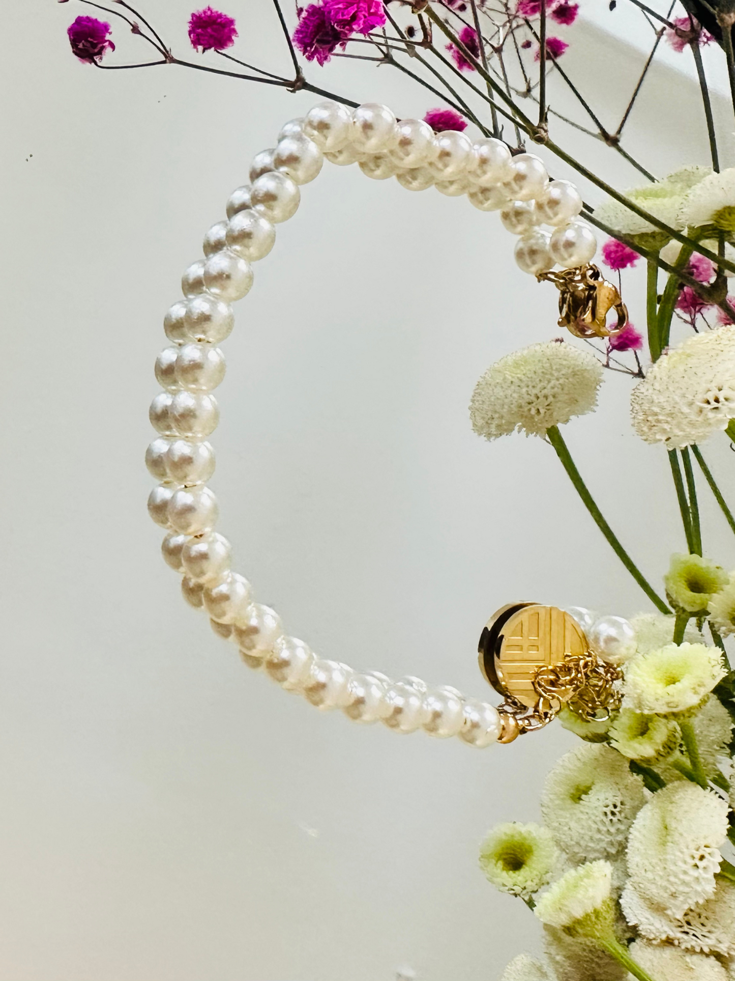 Bracelet perles & médaillon doré