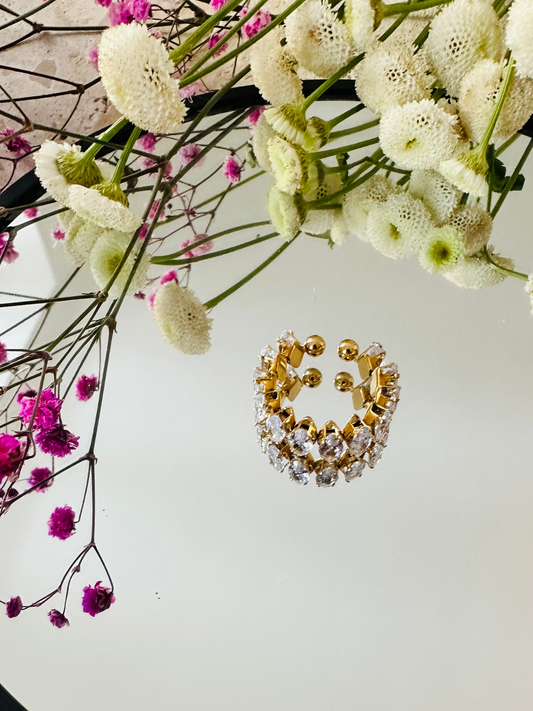 Bague ouverte en acier doré – Sertie de zircons marquise